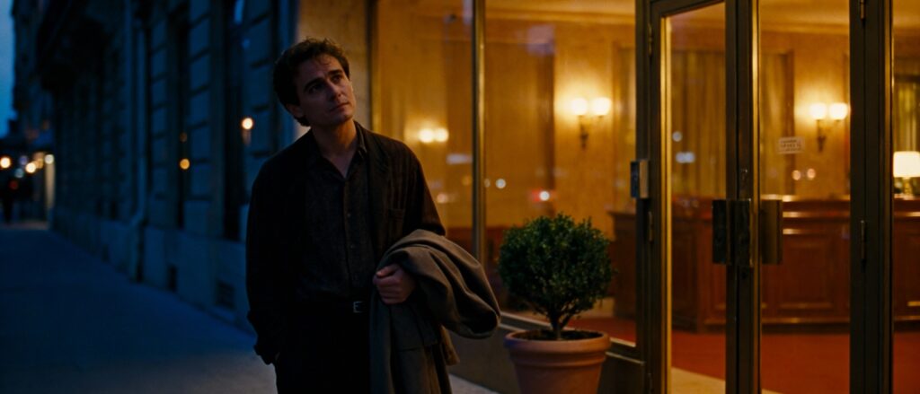 Man waits outside hotel not sure if he should enter