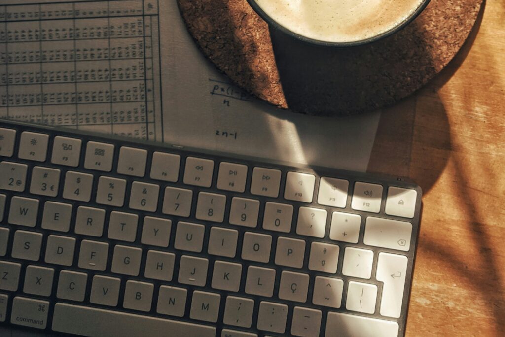 Keyboard, coffee, documents